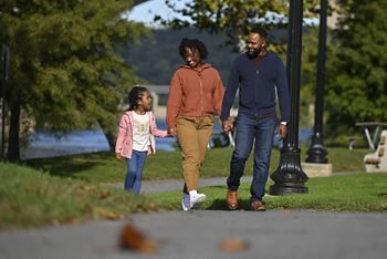 a family walking in a park